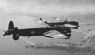 Lancaster de l'escadrille 4.S survolant la base navale de Mers-el-Kébir. (©DR via Pierre-Henri Baras)