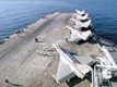 Rafale M F1 sur le pont du Charles de Gaulle  pendant l'Opération Héraclès. (©Marine Nationale)