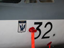Insigne de la 57.S sur le Falcon 10 MER n° 32 vu à Landivisiau en juillet 2003. (©French Fleet Air Arm)