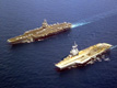 Le Charles de Gaulle et le porte-avions américain USS Enterprise naviguant de conserve. (©US Navy)