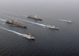 Les groupes aéronavals de l'USS Ronald Reagan et Charles de Gaulle naviguant ensemble. (©Marine Nationale)